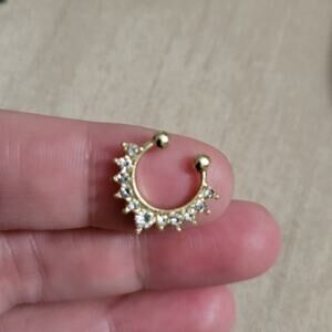Gold tone clip on crystal septum ring